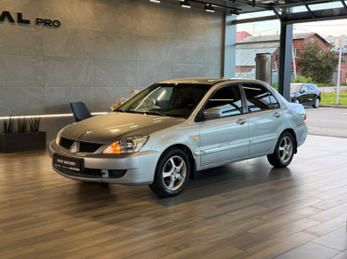 Автомобиль с пробегом Mitsubishi Lancer в городе Екатеринбург ДЦ - Lucky Motors на Эскадронной