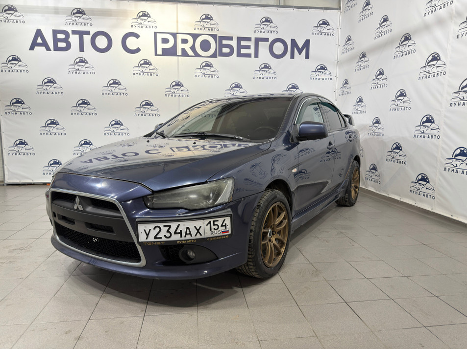 Автомобиль с пробегом Mitsubishi Lancer в городе Новосибирск ДЦ - PANGO Центр Луна