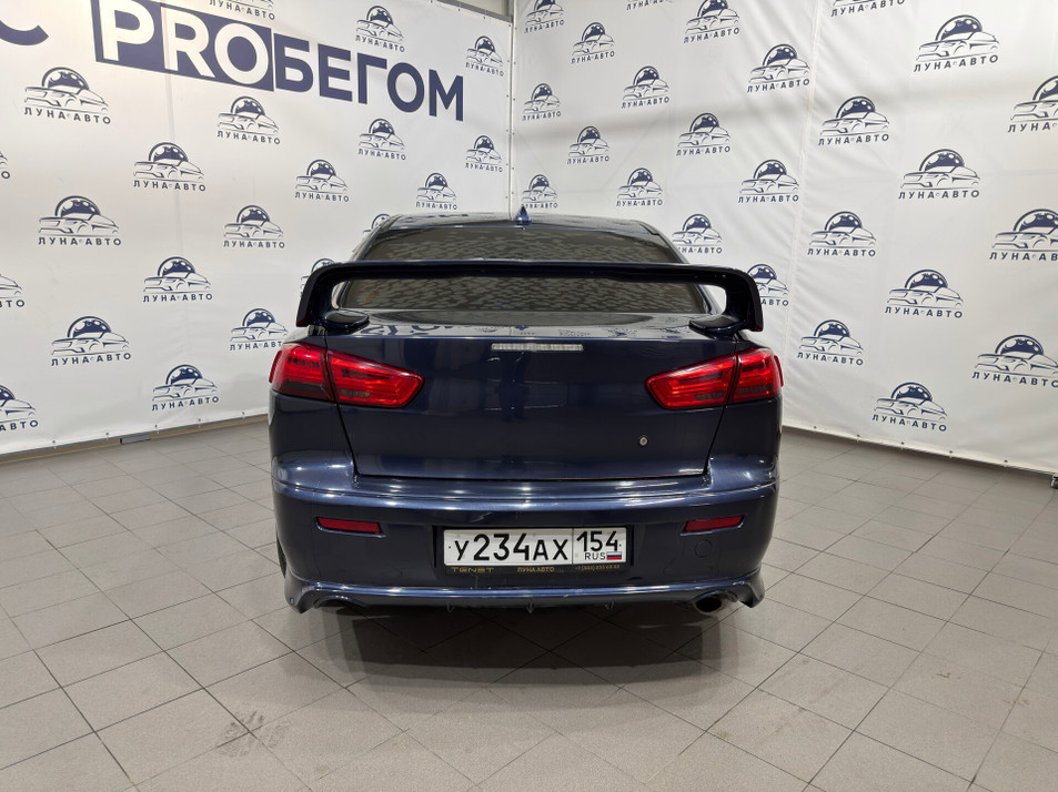 Автомобиль с пробегом Mitsubishi Lancer в городе Новосибирск ДЦ - PANGO Центр Луна