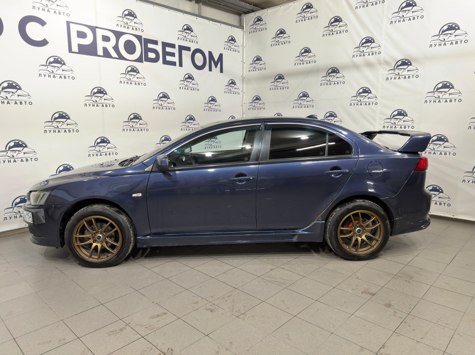 Автомобиль с пробегом Mitsubishi Lancer в городе Новосибирск ДЦ - PANGO Центр Луна