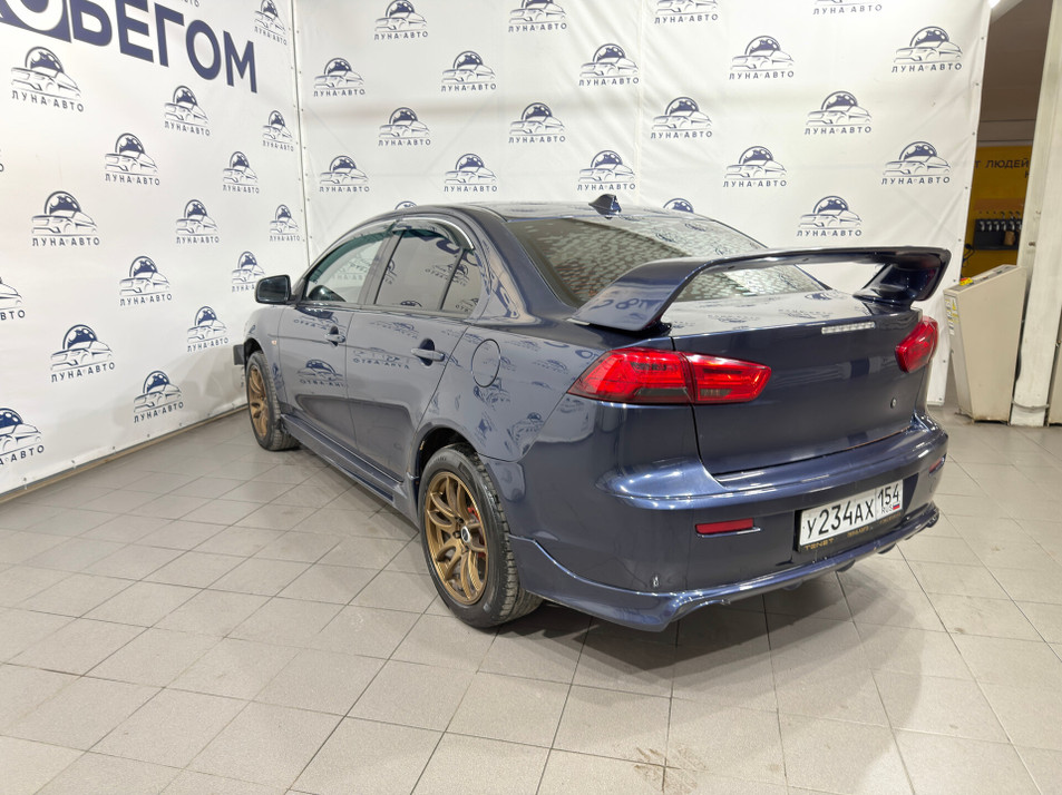 Автомобиль с пробегом Mitsubishi Lancer в городе Новосибирск ДЦ - PANGO Центр Луна